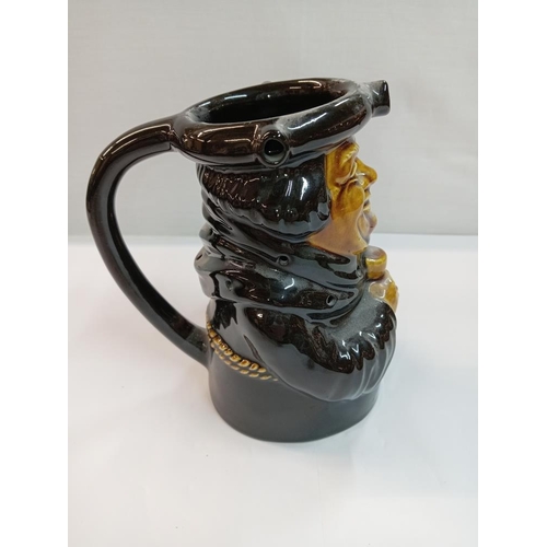 1266 - A Dartmouth pottery Black Friar gin Toby puzzle jug. Height 17cm