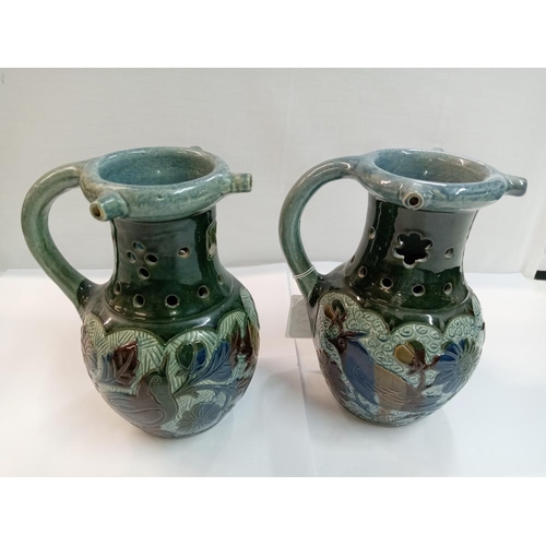 1271 - 2 Lauder Barum pottery bird decorated puzzle jugs. Height 18cm