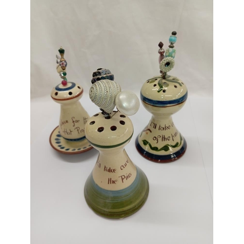 1275 - 6 Devon pottery Torquay ware hat pin stands