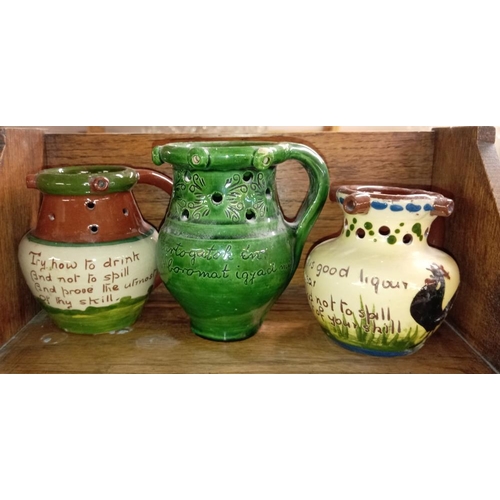 1338 - 6 mid size Torquay ware puzzle jugs