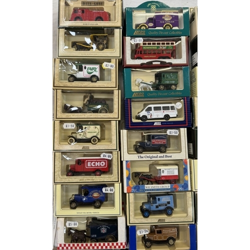 123 - 32 Lledo model vans including Tetley