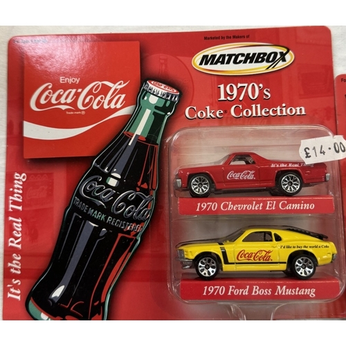 148 - A quantity of Matchbox Coca-Cola collectors models