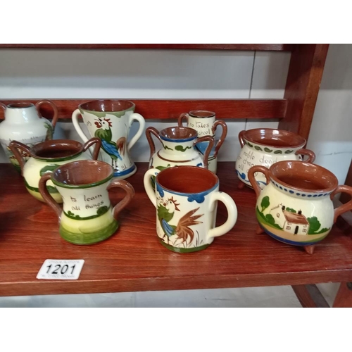 1201 - A good selection of Torquay pottery including Cauldrons, Loving cups & 2 handle vases