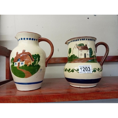 1203 - 3 Pieces of Torquay pottery jugs