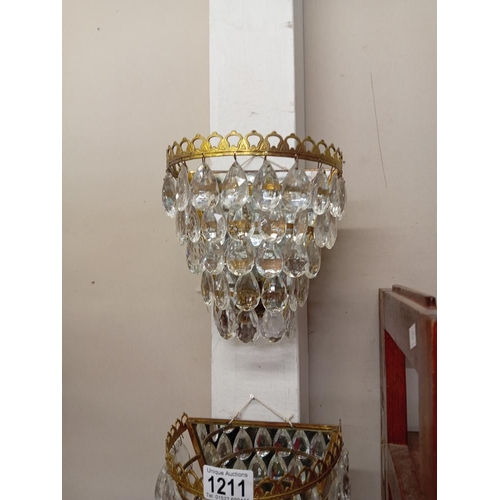 1211 - A pair of French mirror back chandelier wall lights with tear drop glass droppers