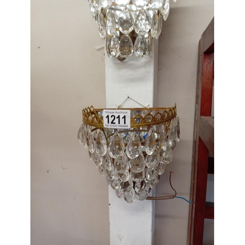 1211 - A pair of French mirror back chandelier wall lights with tear drop glass droppers