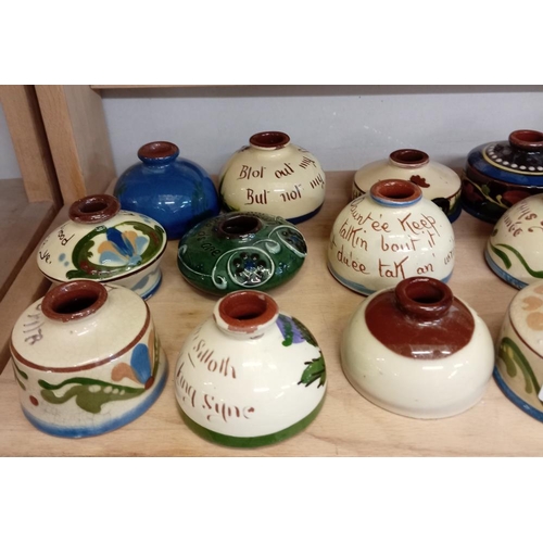 1213 - A good selection of Torquay pottery inkwells including C.H Brannum etc