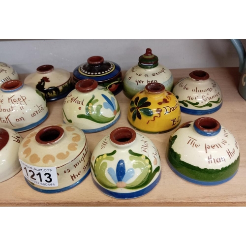 1213 - A good selection of Torquay pottery inkwells including C.H Brannum etc