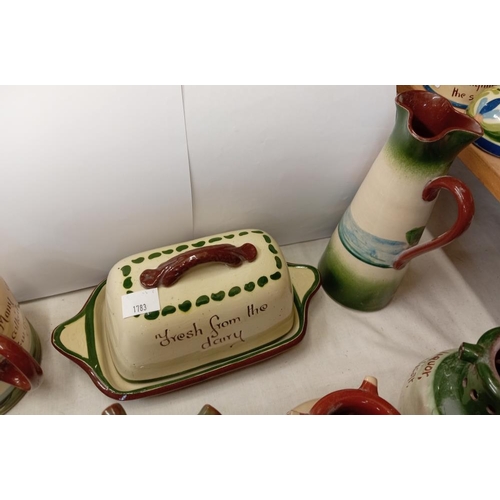 1217 - A quantity of Torquay ware including butter dish, chamber candle stick etc, 5 Items