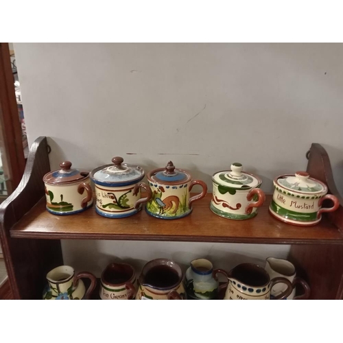 1250 - 20 Pieces of small Torquay ware including preserve pots & jugs