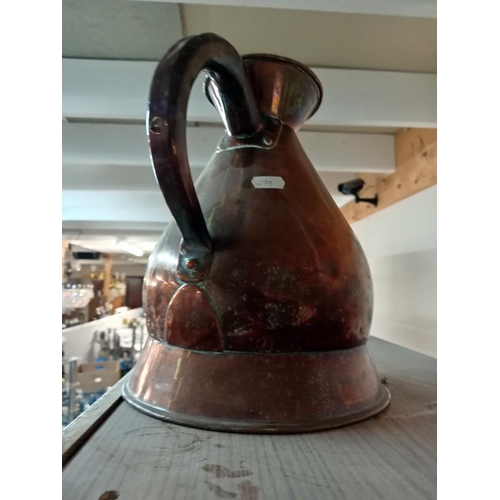 1181 - A large copper beer jug.