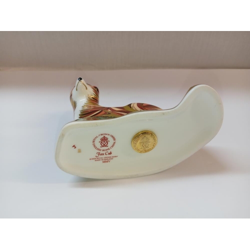 1401 - A Royal Crown Derby fox cub with gold stopper