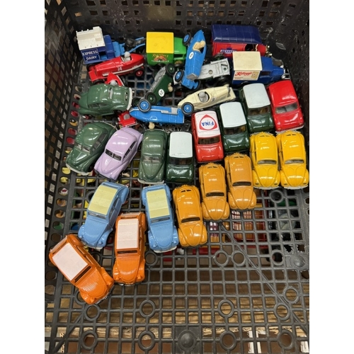 208 - An unboxed Corgi etc including VW Beetle, Mini, Morris Minor etc