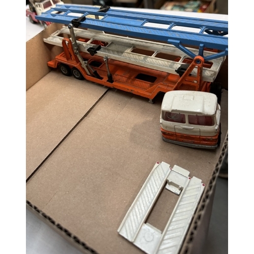 228 - An unboxed Corgi tri-deck car transporter, Thames ice cream vans, Holmes wrecker etc