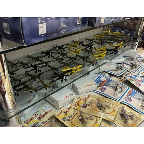 410 - A quantity of boxed Tonka Hurricane model planes in blister packs & A large lot of loose models