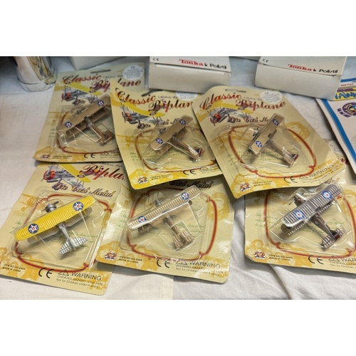 410 - A quantity of boxed Tonka Hurricane model planes in blister packs & A large lot of loose models