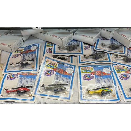 410 - A quantity of boxed Tonka Hurricane model planes in blister packs & A large lot of loose models