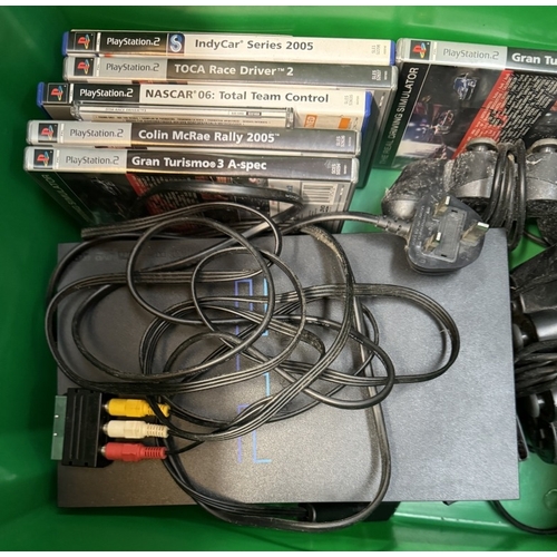 417 - A Playstation 2 with 2 controllers & A quantity of games