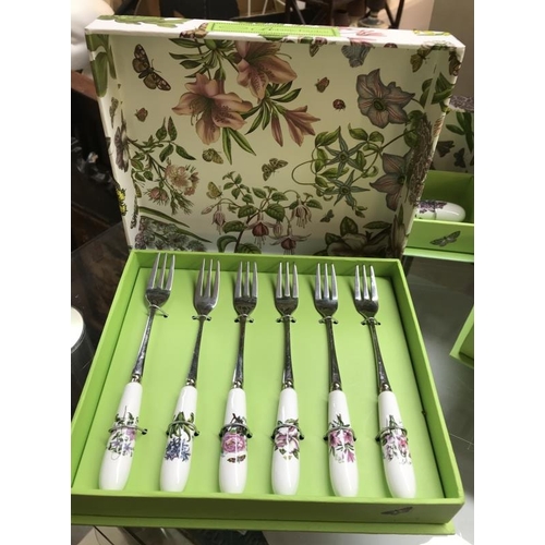 1414 - A collection of 5 boxed Portmeirion serving sets, salad spoons, cake slicers etc