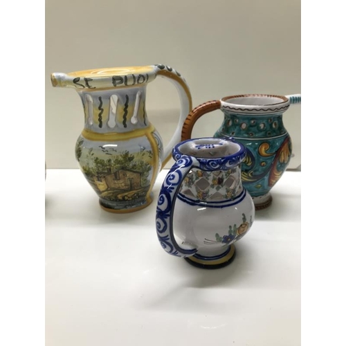 1445 - 5 European style puzzle jugs inc Quimper