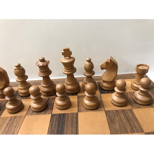 1446 - Vintage box wood chess set in hardwood box with an inlaid chess board.