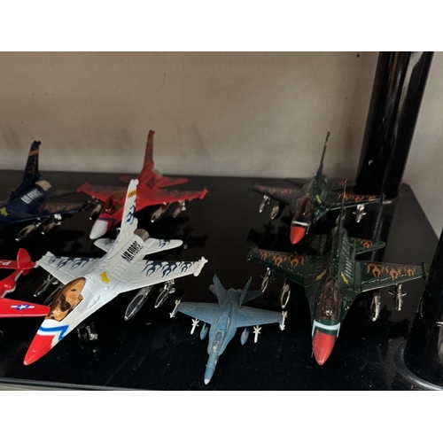 424 - A good selection of unboxed aircraft & 2 Minic ships