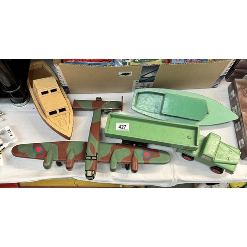 427 - A Scratch built painted wooden aircraft, Lorry & Two boats