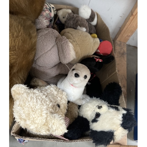 430 - A large lot of soft toys including Womble