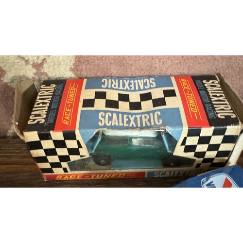 A vintage Scalextric & Airfix slot cars including Mini & Jaguar