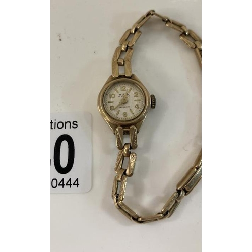 1040 - A 9ct Gold ladies Avia watch. Total weight 13.10g