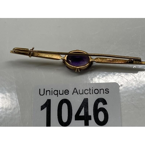 1046 - A15ct Gold Tie pin with Purple stone (total weight 4.45g)