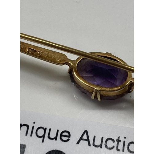 1046 - A15ct Gold Tie pin with Purple stone (total weight 4.45g)