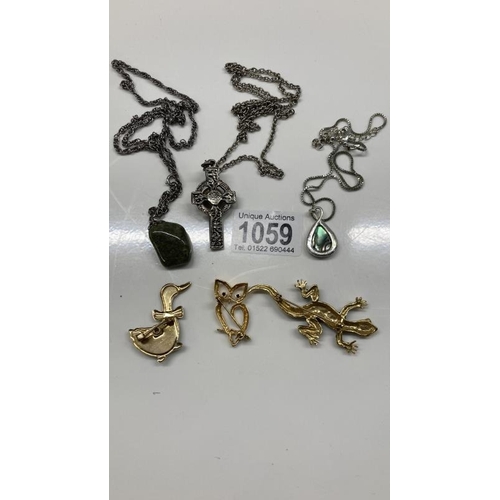 1059 - Three animal style broaches, including lizard. Three Scottish / Celtic style chains with pendants