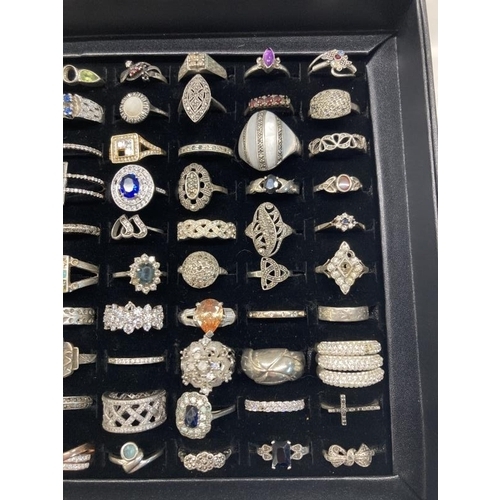 1054 - A Good tray of 100 silver & White metal rings . Tray Weight-125g. Ring Weight -373g. Total weight 49... 