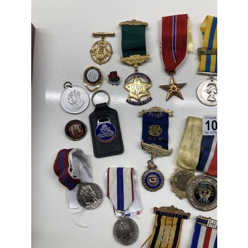 1064 - A mixed lot of 20th century medals etc.,