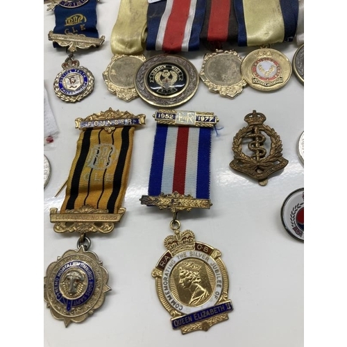 1064 - A mixed lot of 20th century medals etc.,