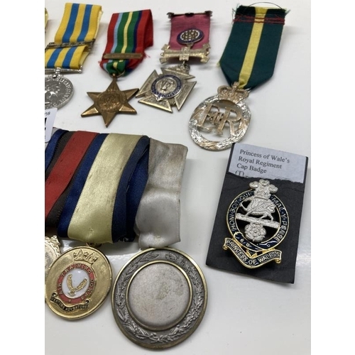 1064 - A mixed lot of 20th century medals etc.,