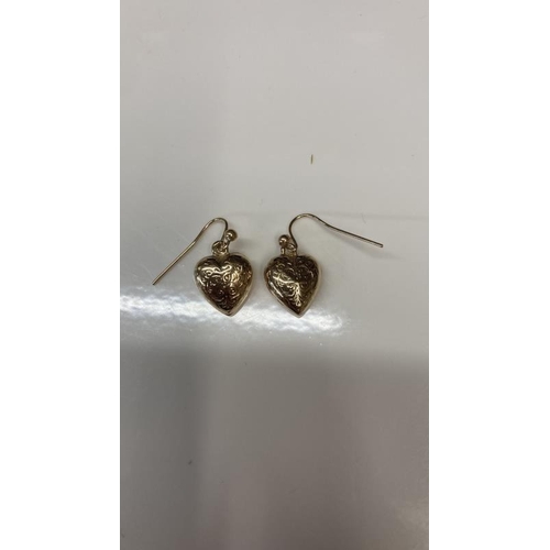 1088 - A pair chased goldwork pendent earrings designed as heart in 9ct gold