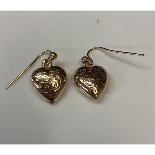 1088 - A pair chased goldwork pendent earrings designed as heart in 9ct gold