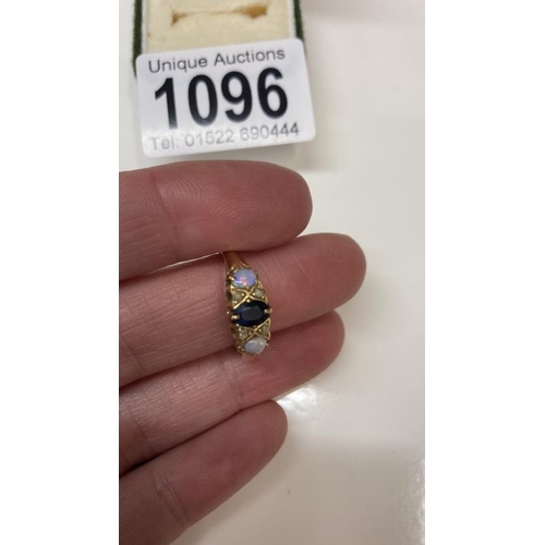 1096 - A gold ring set imitation opals, diamonds sapphire total weight 3.26g