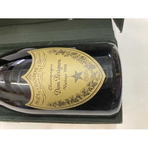 1100H - A boxed bottle of 1998 Dom Perignon champagne with documents