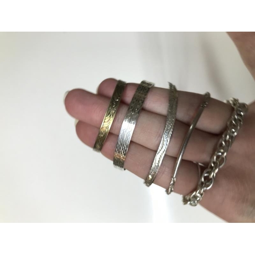 1100J - 6 items of silver including chains bangles etc