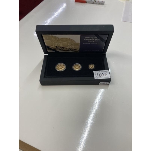 1100F - A cased 2022 king George VI tribute gold sovereign prestige set with COA sovereign, half sovereign, ... 