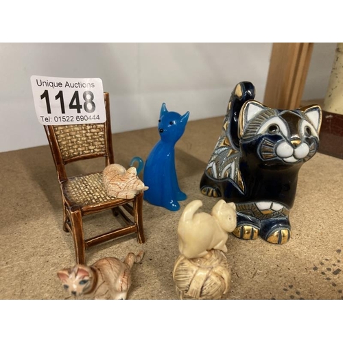 1148 - A selection of cat ornaments