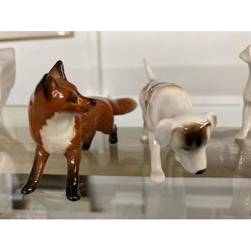 1159 - Three Beswick hounds & Two Beswick foxes