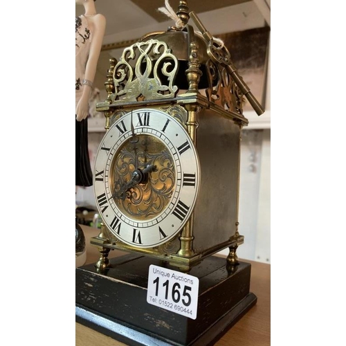 1165 - A lantern clock, both springs ok. Chimes in wrong order