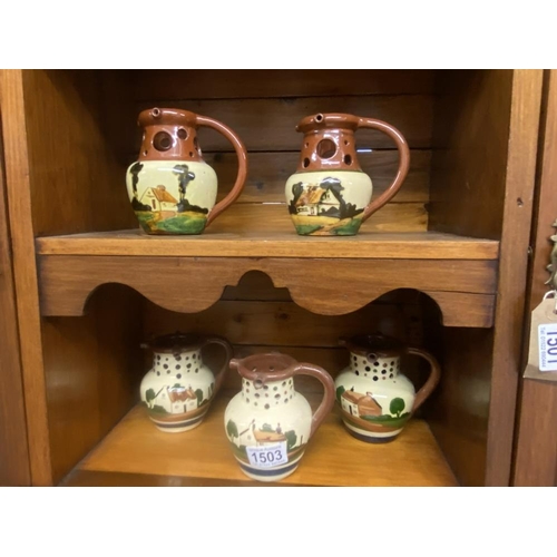 1503 - 5 Torquay ware puzzle jugs