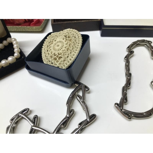 1460S - A mixed lot of jewellery & watches including heart shaped pendant, chains & faux Pearl sets