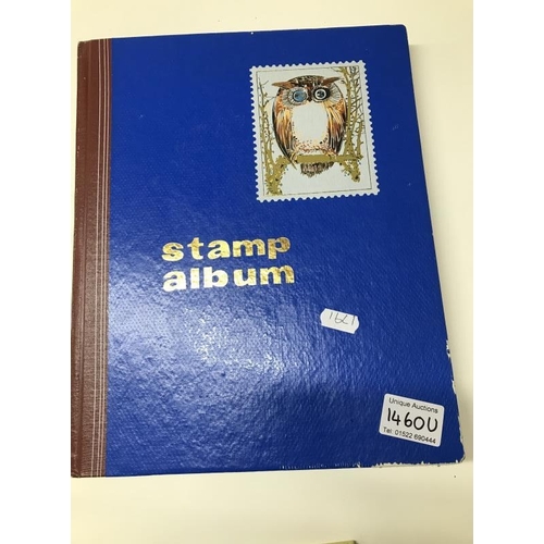 1460U - A stamp album including a selection ofmint Great Britain stamps etc