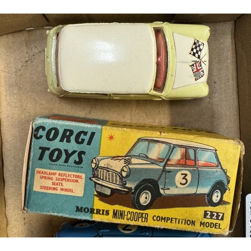 610 - 2 x Corgi 227 Morris Mini Cooper competition model in blue and primrose yellow